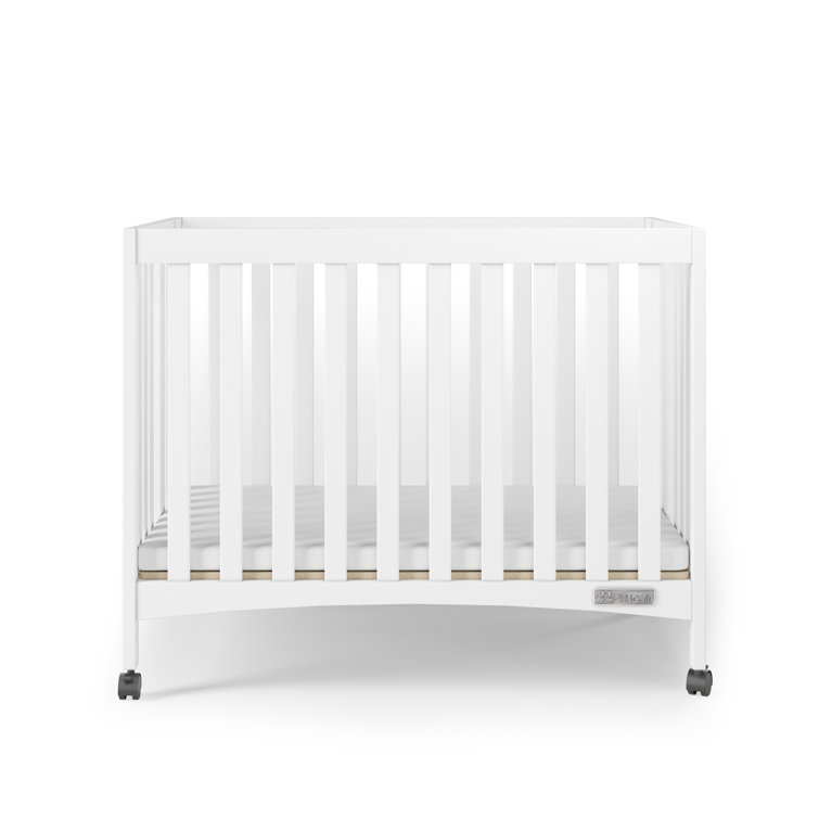 Mini crib best sale on wheels